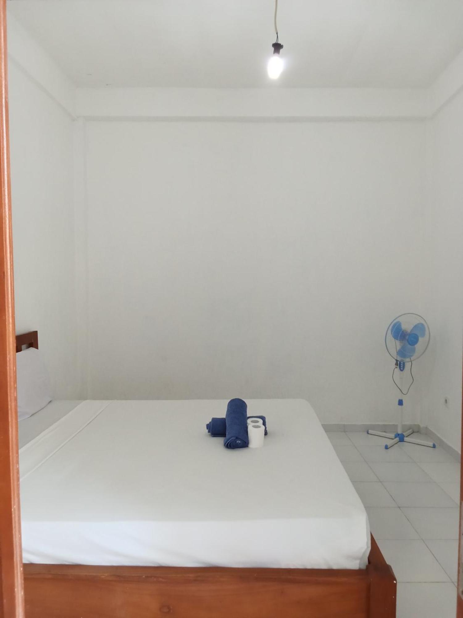 Komang Homestay Амед Екстер'єр фото