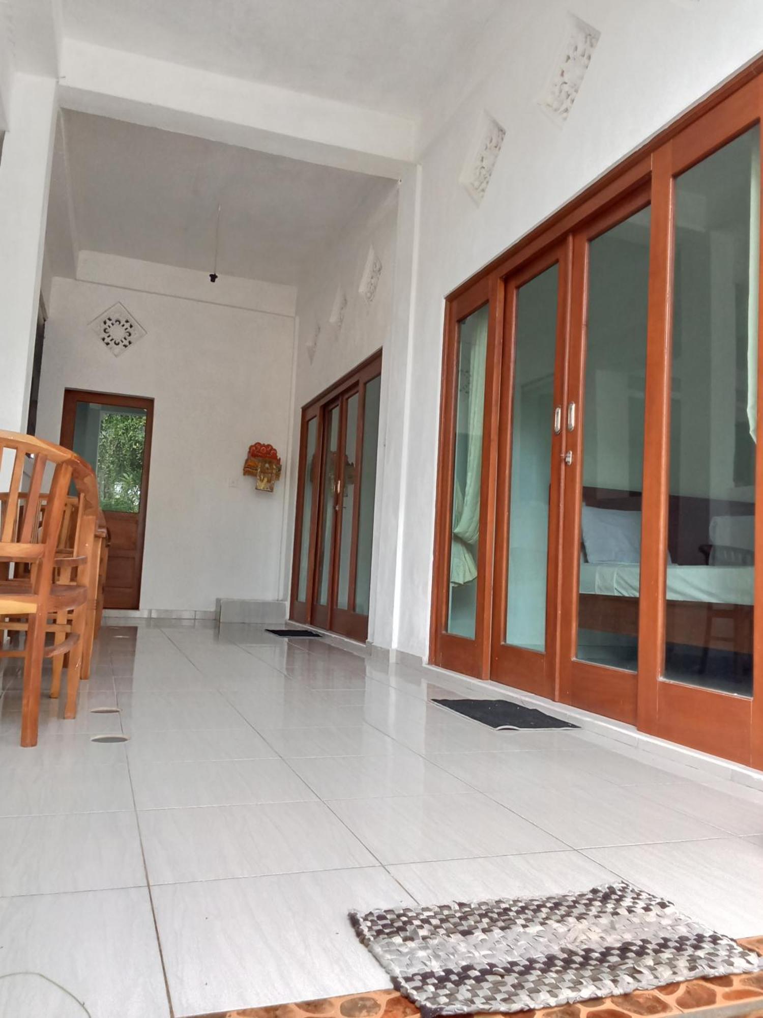 Komang Homestay Амед Екстер'єр фото