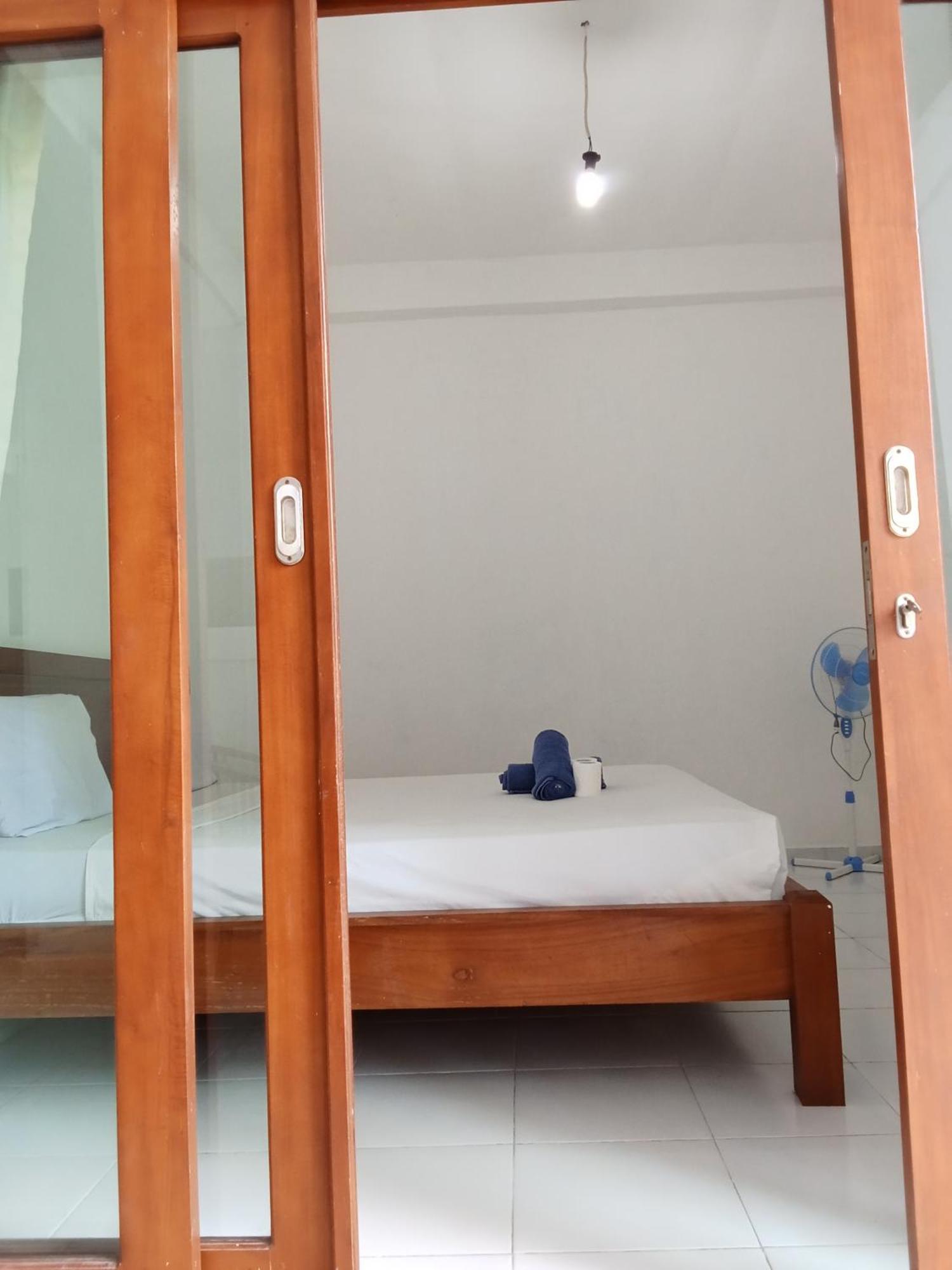 Komang Homestay Амед Екстер'єр фото