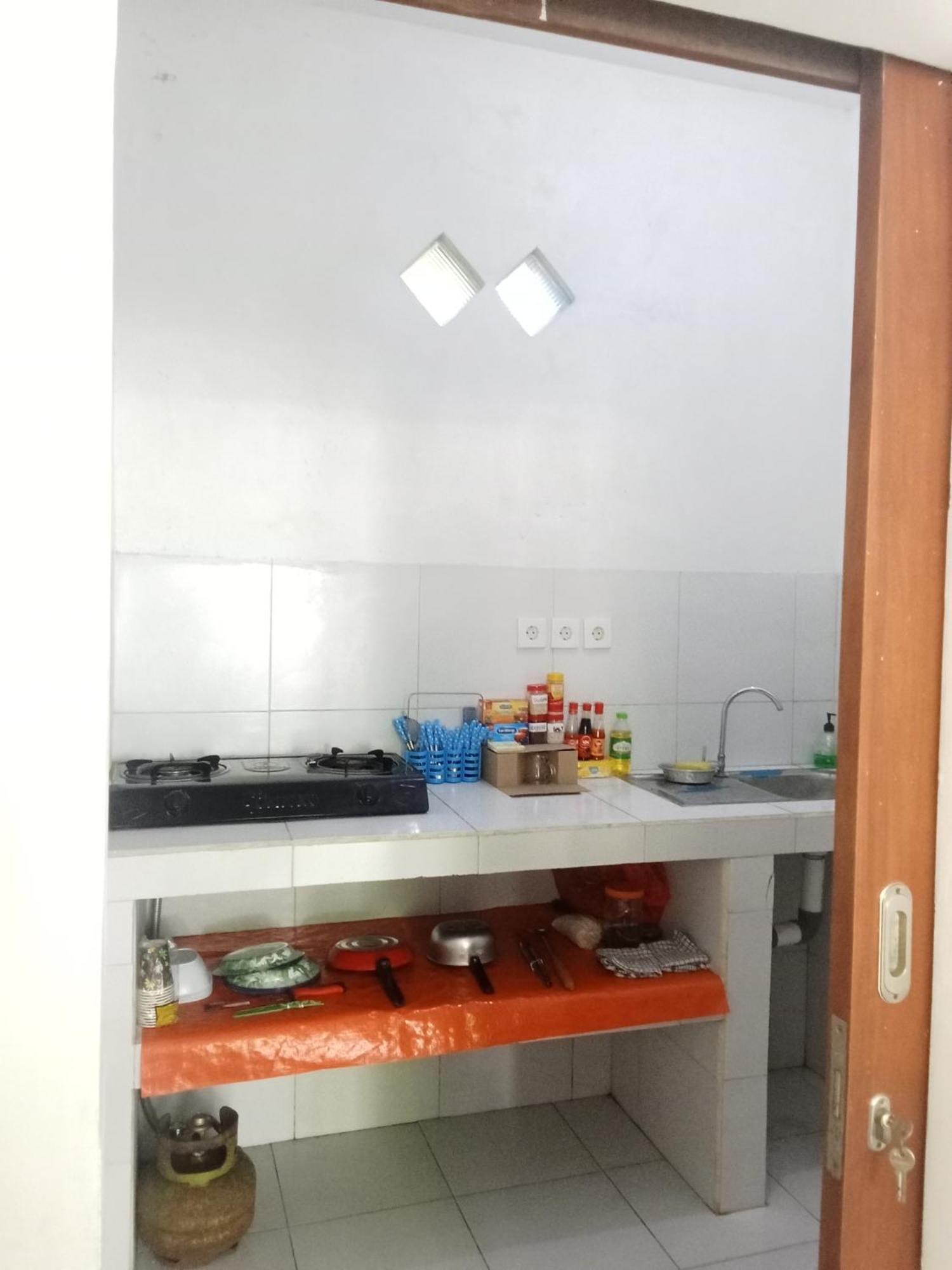 Komang Homestay Амед Екстер'єр фото